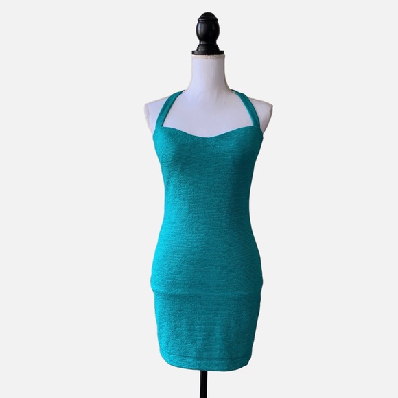 OFF  BEBE TEAL BODYCON RIBBED CUTOUT MINI DRESS - Picture 14 of 15
